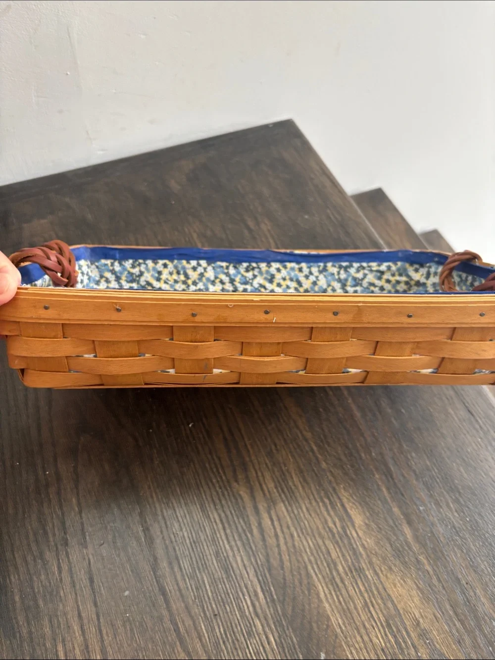 Longaberger basket 2008 w/ blue cloth lining, woven leather handles, 10.5x15x3”